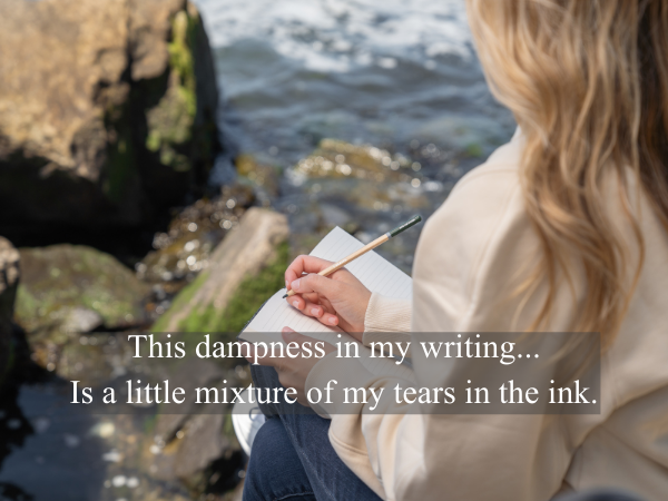 Handwritten poetry with blurred ink drops representing tears